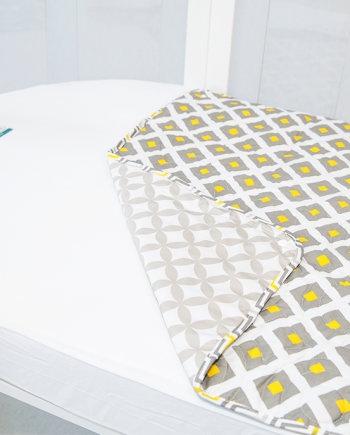 Amani Bebe Organic Oval Quilt Coverlet