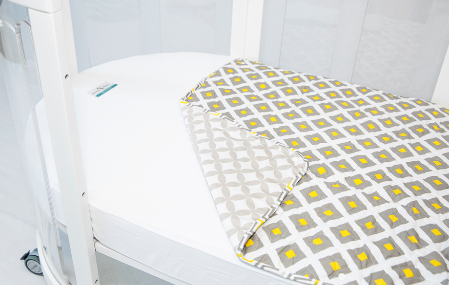 Amani Bebe Organic Oval Quilt Coverlet